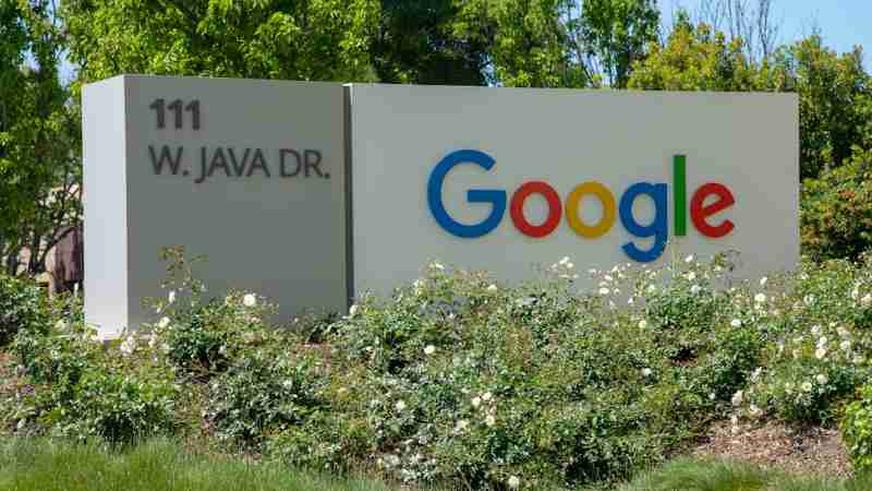 a google sign in front of some bushes and trees - Google in Sunnyvale, CA, at West Java Drive., tags: kairos power - unsplash